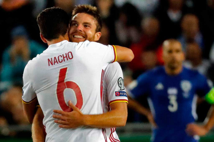 Spanyol yang sudah memastikan diri lolos ke Rusia tahun depan mengemas 28 poin di puncak klasemen, sementara Italia di urutan kedua dengan 23 poin.  AFP/Thomas Coex