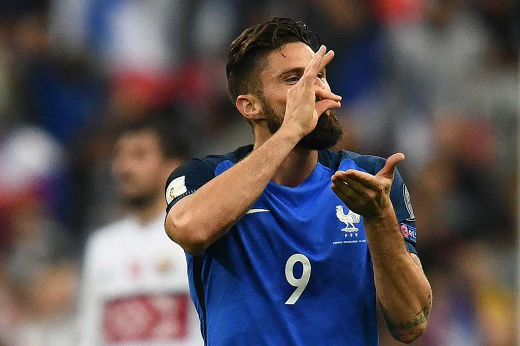 Selebrasi unik Giroud. AFP/Franck Fife