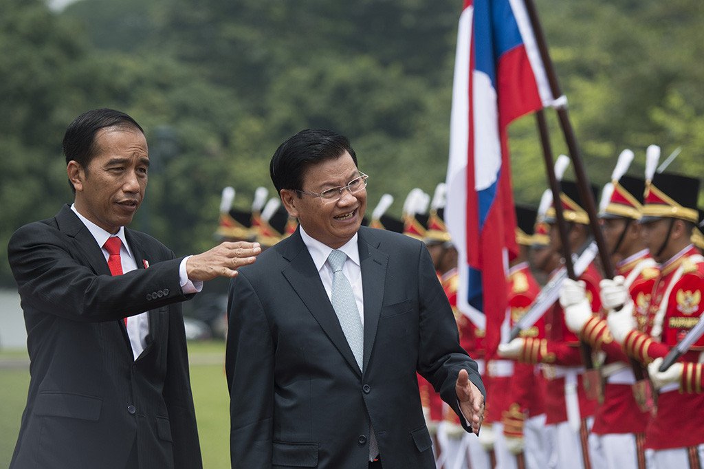 Presiden Joko Widodo menerima kedatangan Perdana Menteri Republik Demokratik Rakyat Laos, Thongloun Sisoulith di Istana Bogor, Jawa Barat.