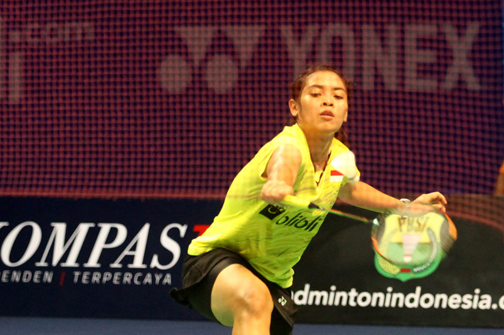 Gregoria Mariska Tunjung mempersembahkan medali emas kedua setelah menaklukkan tunggal putri Tiongkok, Han Yue, dengan skor 21-13, 13-21, dan 24-22.