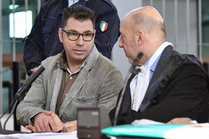 Valentino Talluto, 33, menjalani sidang di sebuah pengadilan di Rebibbia, Italia.