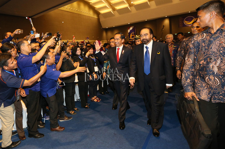 NasDem resmi mengukuhkan Joko Widodo (Jokowi) sebagai capres 2019. Deklarasi itu disampaikan oleh Ketum NasDem Surya Paloh saat Rakernas IV NasDem di JiExpo Kemayoran, Jakpus.