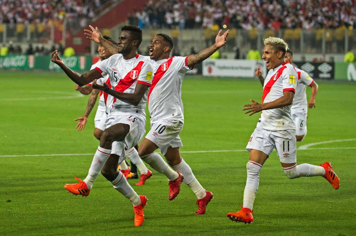 Christian Ramos menggandakan keunggulan tuan rumah pada menit ke-65, menyambar bola liar dari skema sepak pojok. AFP/Ernesto Benavides