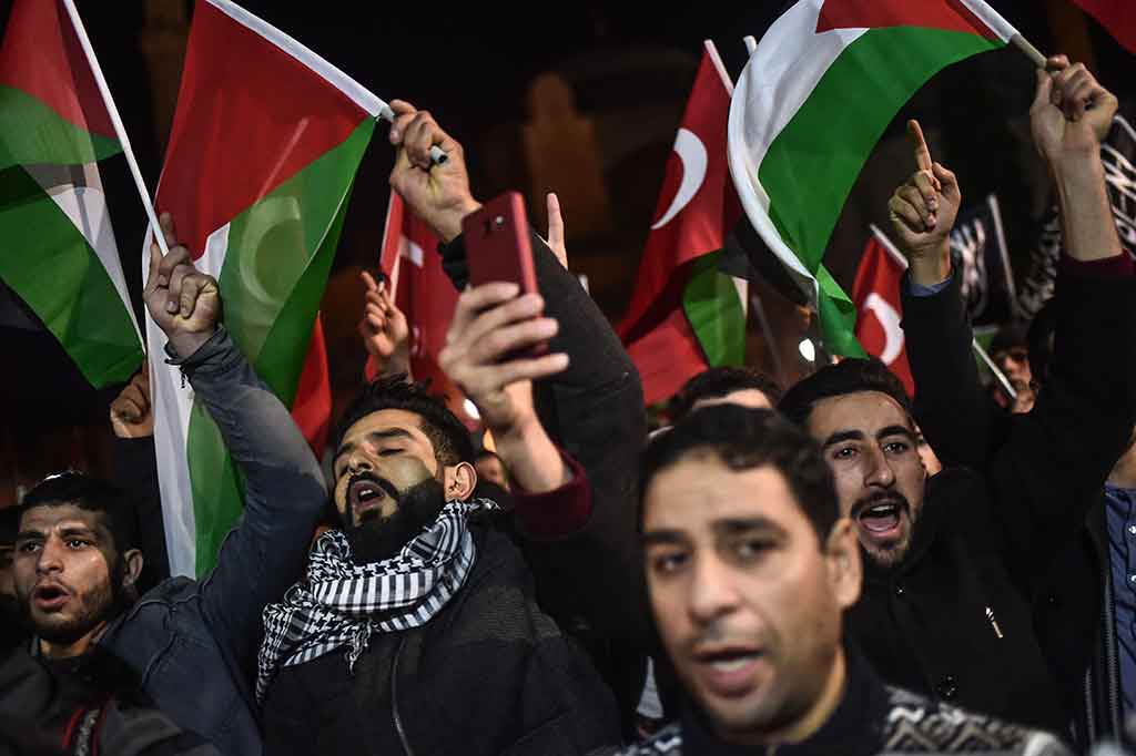 Aksi protes menentang pengakuan AS bahwa Yerusalem sebagai Ibu Kota Israel juga terjadi di Turki. AFP/Ozan Kose