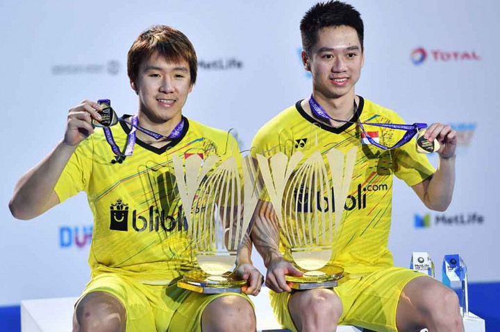 Marcus/Kevin baru saja mencetak rekor dengan menjuarai tujuh turnamen super serius dalam setahun kalender kompetisi yang ditutup di Dubai, dengan mengalahkan Liu Cheng/Zhang Nan (Tiongkok). Sebelumnya The Minions telah menjuarai All England, India Terbuka, Malaysia Terbuka, Jepang Terbuka, Tiongkok Terbuka, Hong Kong Terbuka, dan BWF Superseries Finals 2017 Dubai. Jumlah ini mengungguli rekor sebelumnya, Lee Yong-Dae/Yoo Yeong-Seong dengan enam kemenangan. AFP/Giuseppe Cacace