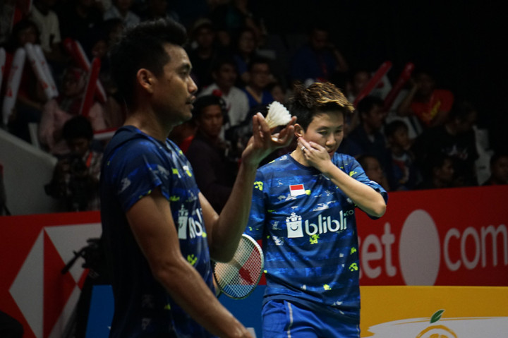 Tontowi Ahmad/Liliyana Natsir kalah dua gim langsung dengan skor 14-21 dan 11-21 pada pertandingan yang digelar di Istora Senayan. MTVN/Kautsar Halim