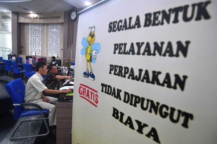 Seorang wajib pajak melaporkan SPT tahunan melalui e-Filing di Kanwil DJP Wajib Pajak Besar, Jakarta, Selasa, 13 Maret 2018. 