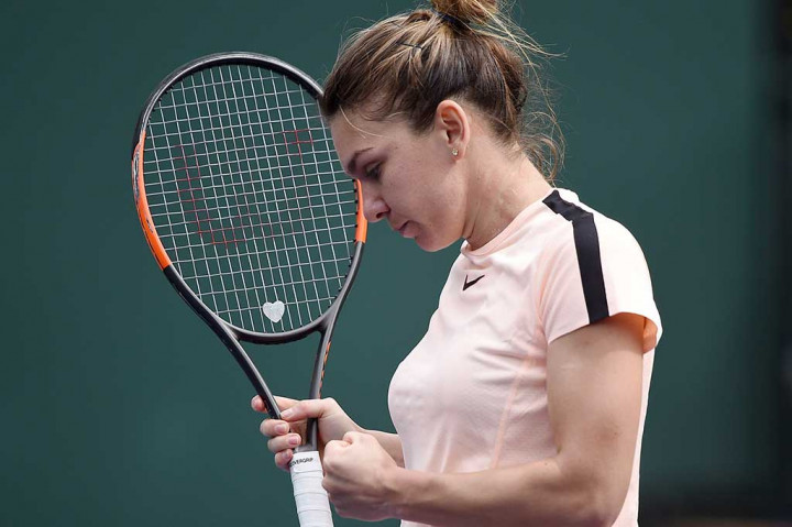 Halep menyudahi perlawanan Wang dalam waktu 76 menit untuk bertemu Petra Martic dari Kroasia yang mengalahkan petenis Ceko Marketa Vondrousova 6-3, 7-6 (7/4).