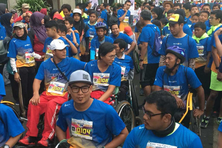 Peserta difabel atau berkebutuhan khusus bersiap mengikuti kompetisi lari Heritage Run 2018 di Kawasan Kota Tua, Jakarta. Medcom.id/Gregah Nurikhsani