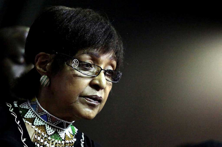 Winnie Mandela yang menikah dengan Nelson Mandela selama 38 tahun, berperan penting dalam mengakhiri pemerintahan minoritas kulit putih. Namun tempatnya dalam sejarah juga ternoda oleh kontroversi dan tudingan tindak kekerasan. AFP/RAJESH JANTILAL