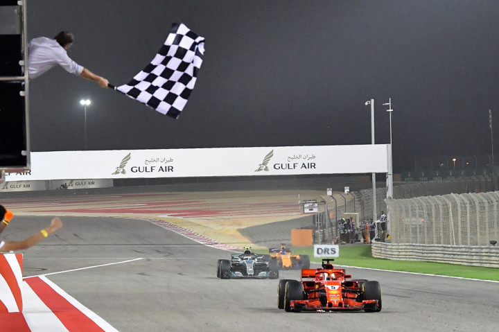 Vettel menjadi juara setelah melahap 57 lap dengan catatan waktu 1 jam 32 menit 1,940 detik. Pebalap asal Jerman itu mengalahkan Valtteri Bottas (Mercedes) yang finish lebih lambat 0,699 detik. AFP/GIUSEPPE CACACE