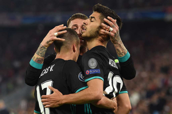 Serangan balik sempurna membuat pemain pengganti Real Marco Asensio dapat menaklukkan Sven Ulreich pada menit ke-57. Skor berubah menjadi 1-2 untuk Madrid. AFP/Christof Stache