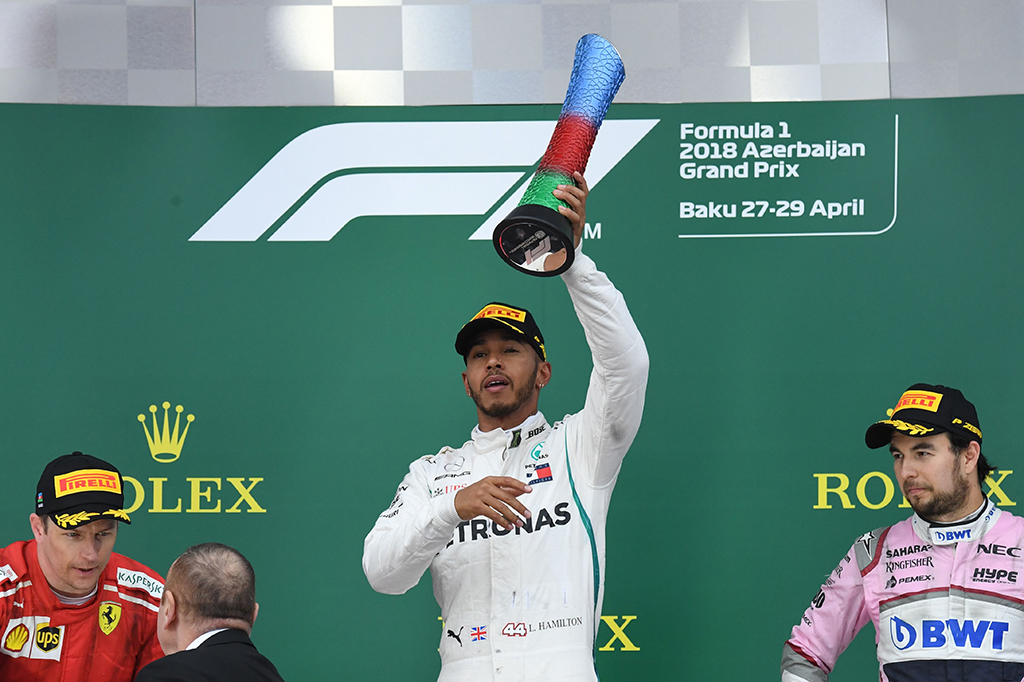 Podium ketiga diraih Sergio Perez dari Force India yang sebelumnya start di posisi kedelapan. AFP/KIRILL KUDRYAVTSEV