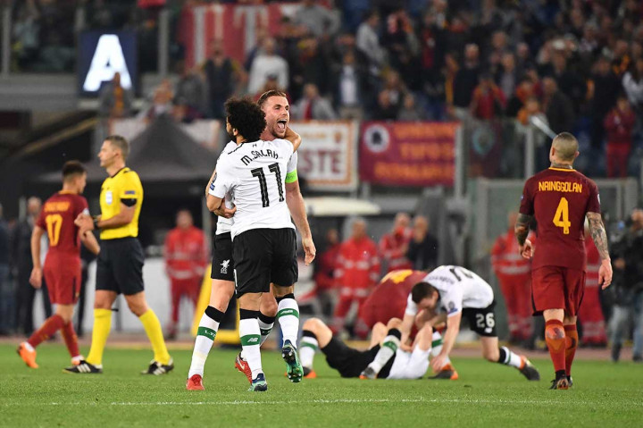 Namun Liverpool yang terakhir kali meraih gelar Eropanya pada 2005, mampu mempertahankan kedudukan 2-4 hingga laga usai untuk mencapai final ke-10 di Liga Champions. AFP/Alberto Pizzoli
