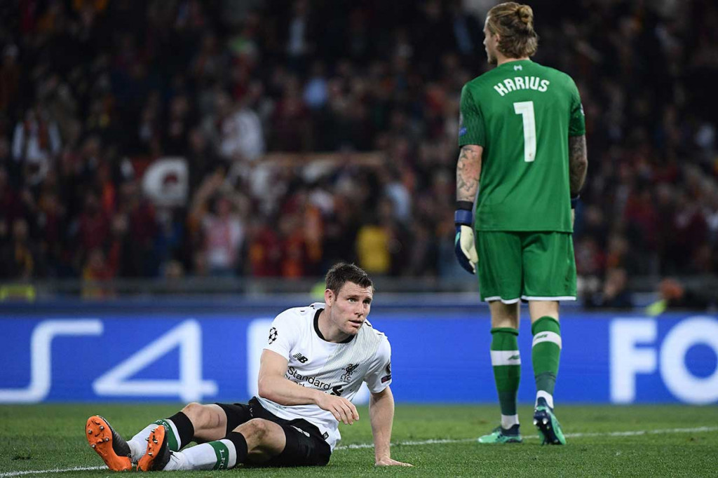 Menit ke-15 Roma menyamakan kedudukan akibat gol bunuh diri James Milner. AFP/Filippo Monteforte