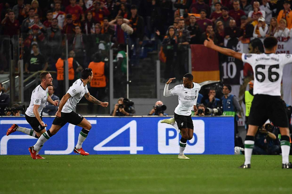 Namun 10 menit kemudian The Red kembali unggul melalui gol pemain asal Belanda Georginio Wijnaldum. AFP/Alberto Pizzoli