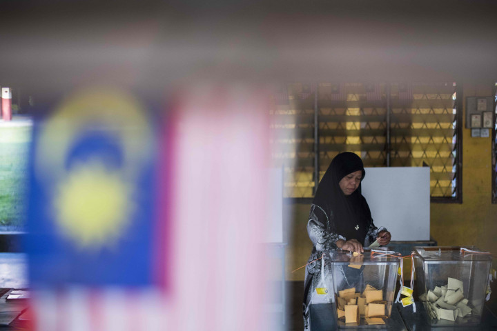 Pemilu ke-14 Malaysia ini diikuti 3 koalisi partai. Ada koalisi Barisan Nasional yang diisi 12 partai, kemudian koalisi Pakatan Harapan yang diisi 4 partai, serta PAS yang berdiri sendiri. AFP/JEWEL SAMAD
