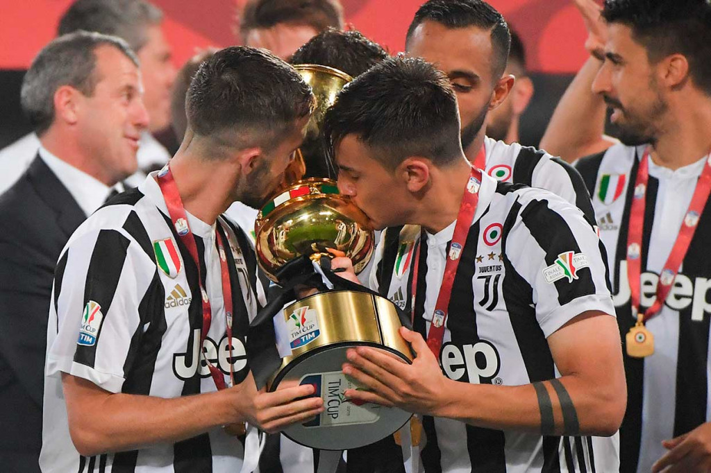 Secara keseluruhan Juve telah 13 kali merengkuh gelar Coppa Italia, sekaligus satu-satunya klub yang menjuarainya empat kali secara beruntun. AFP/Tiziana Fabi