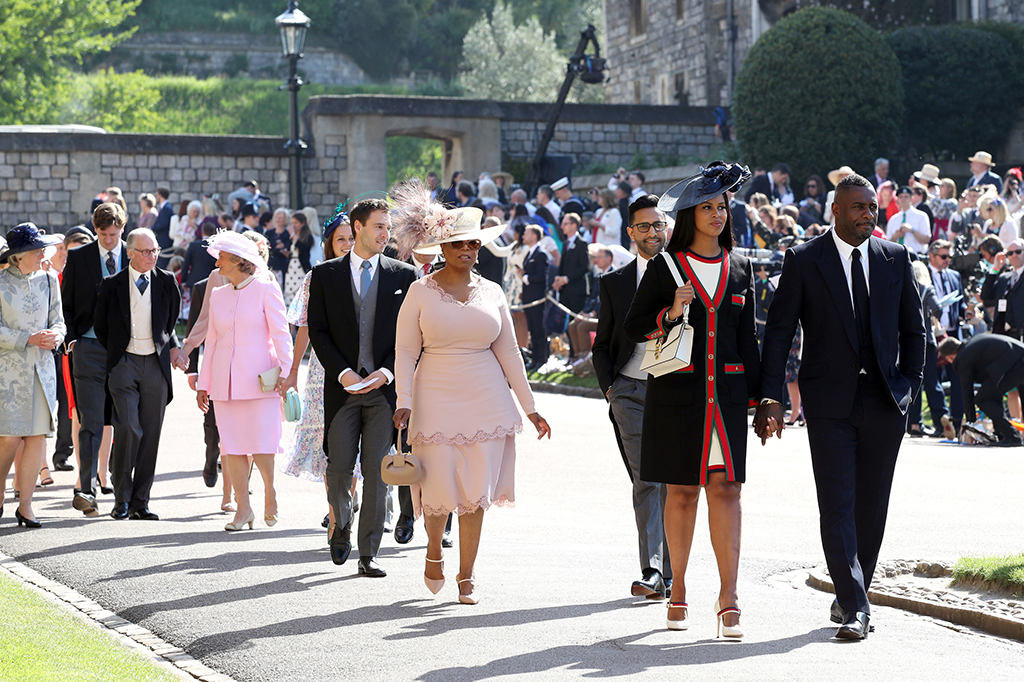 Di antara tamu undangan yang hadir dalam upacara pernikahan kerajaan tersebut terlihat sejumlah selebriti seperti Oprah Winfrey, George dan Amal Clooney, David dan Victoria Beckham, dan Elton John. AFP PHOTO / POOL / Chris Radburn