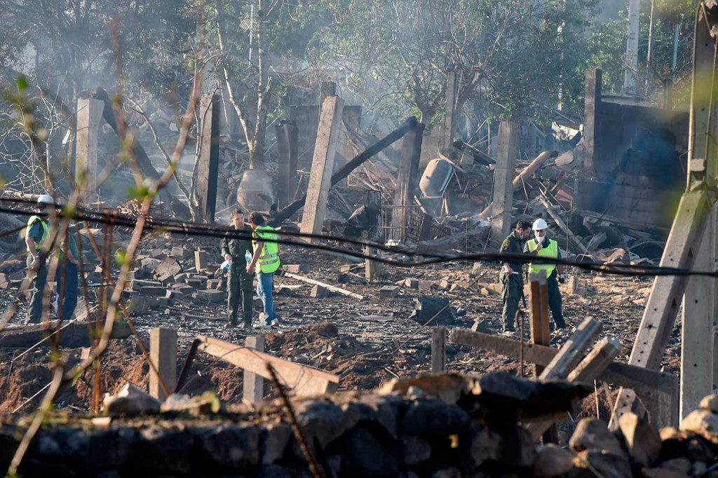 Menurut Wali Kota Tui, Carlos Vazques, ledakan itu diperkirakan terjadi di sebuah rumah warga dan bukan area pergudangan komersial. 