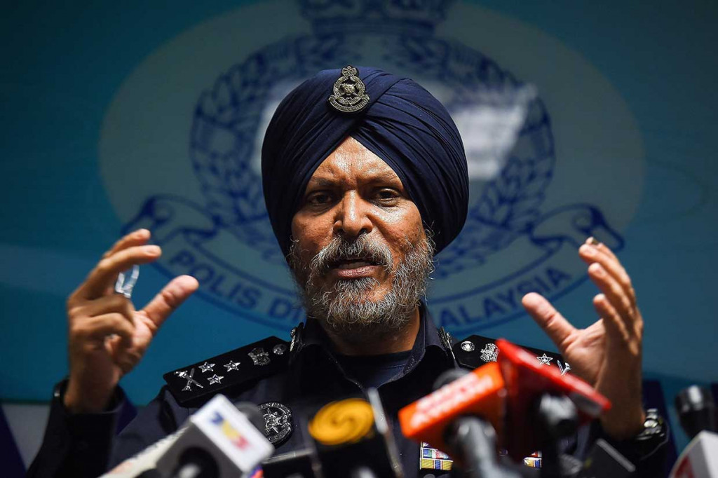 Direktur Jabatan Siasatan Jenayah Komersil atau Kepala Divisi Kejahatan Komersial Kepolisian Diraja Malaysia (PDRM) Amar Singh menggelar jumpa pers di Menara 238 Jalan Tun Razak, Kuala Lumpur, Jumat, 25 Mei 2018, terkait kasus korupsi dana negara 1Malaysia Development Berhad (1MDB).