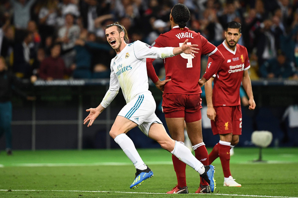 Gol Gareth Bale di menit ke-64 lantas membawa Madrid kembali memimpin. Tendangan saltonya menyambut umpan lambung Marcelo melesak ke pojok kiri atas gawang Liverpool. AFP/FRANCK FIFE