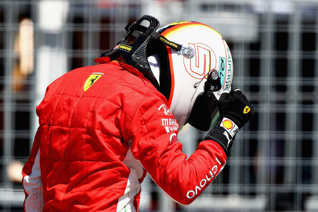 Pembalap Ferrari Sebastian Vettel meluapkan kegembiraannya usai menjadi yang tercepat pada sesi kualifikasi GP F1 Kanada, Minggu, 10 Juni 2018 dini hari WIB.
