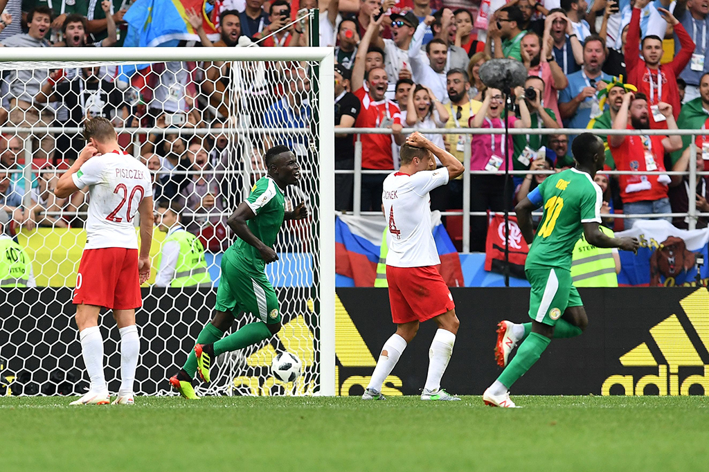 Senegal memimpin pertandingan berkat gol bunuh diri Thiago Cionek pada menit ke-38. Afp Photo/Francisco Leong