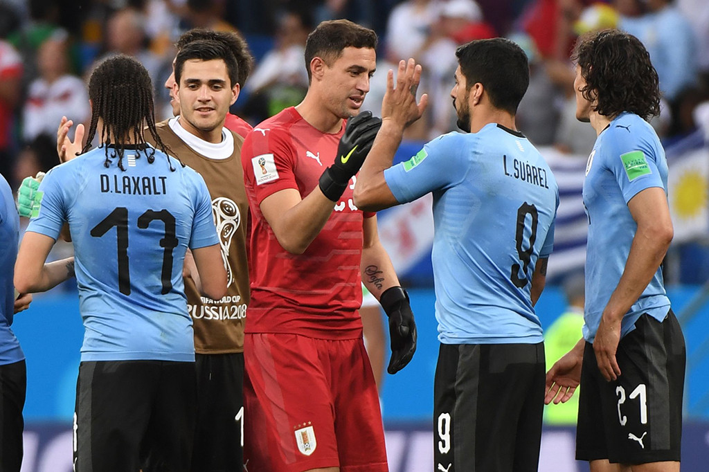 Hasil tersebut membuat Uruguay mengumpulkan enam poin seperti Rusia. Namun, tim tuan rumah menempati peringkat pertama karena unggul selisih gol. Afp Photo/Khaled Desouki