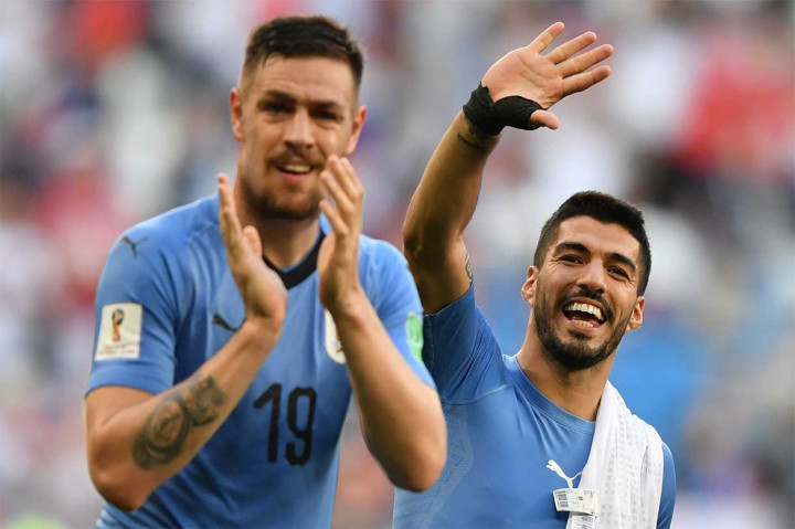 Uruguay menjadi juara grup dengan 9 poin dari tiga pertandingan, sementara Rusia harus puas berada di peringkat dua dengan 6 poin.