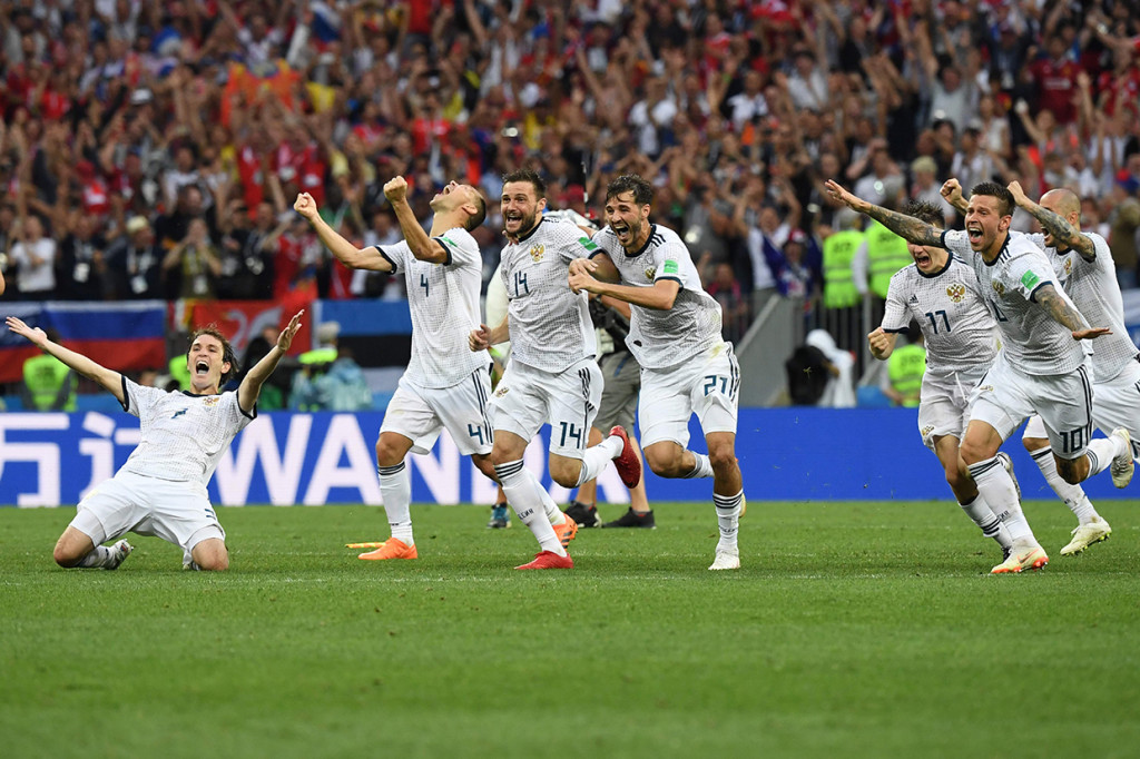 Sementara itu, semua eksekutor dari Rusia sukses menembus gawang dari De Gea. Rusia pun menang dengan skor (4-3). Afp Photo/Yuri Cortez