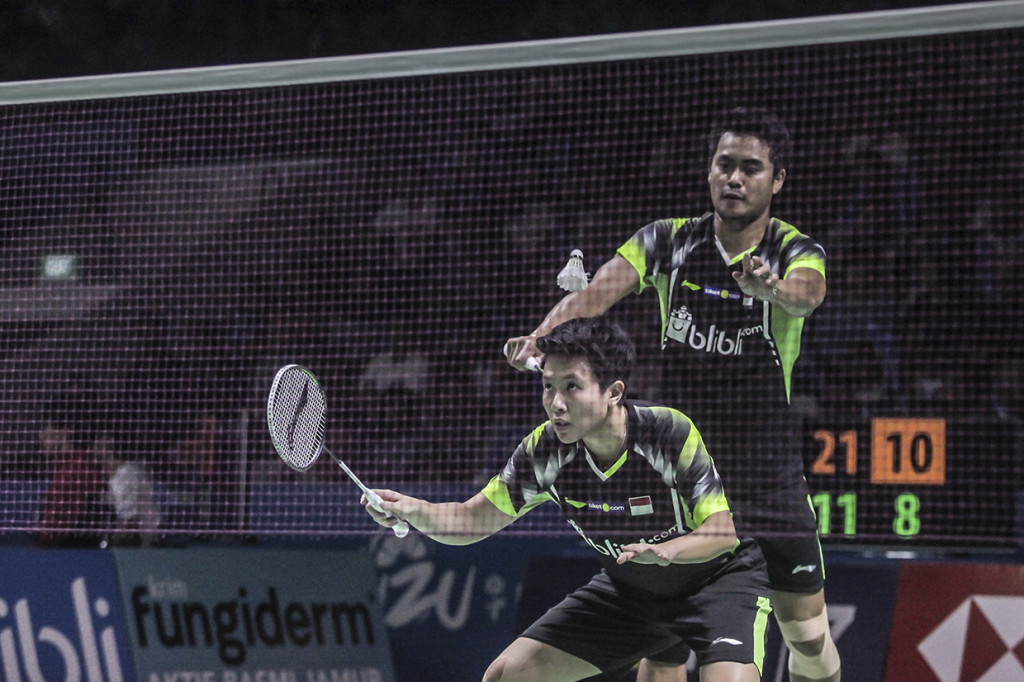 Tontowi/Liliyana menang dengan dua gim 21-11 dan 21-14. Antara Foto/Muhammad Adimaja