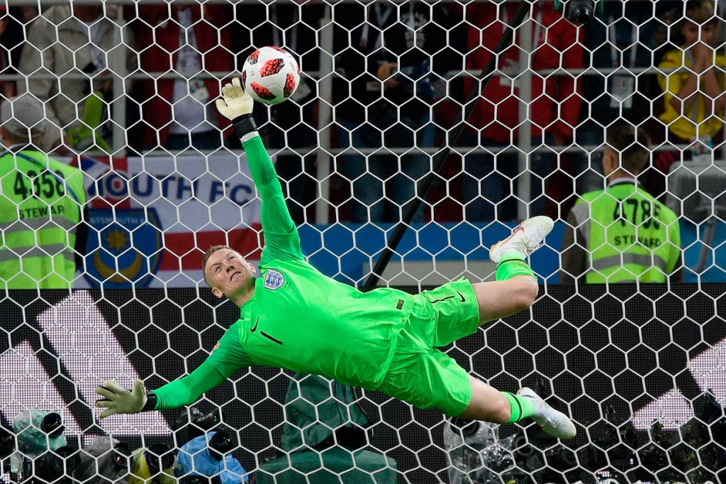 Dalam drama adu penalti, dua penembak penalti terakhir Kolombia Mateus Uribe dan Carlos Bacca gagal menjebol gawang Inggris yang dijaga kiper Jordan Pickford.