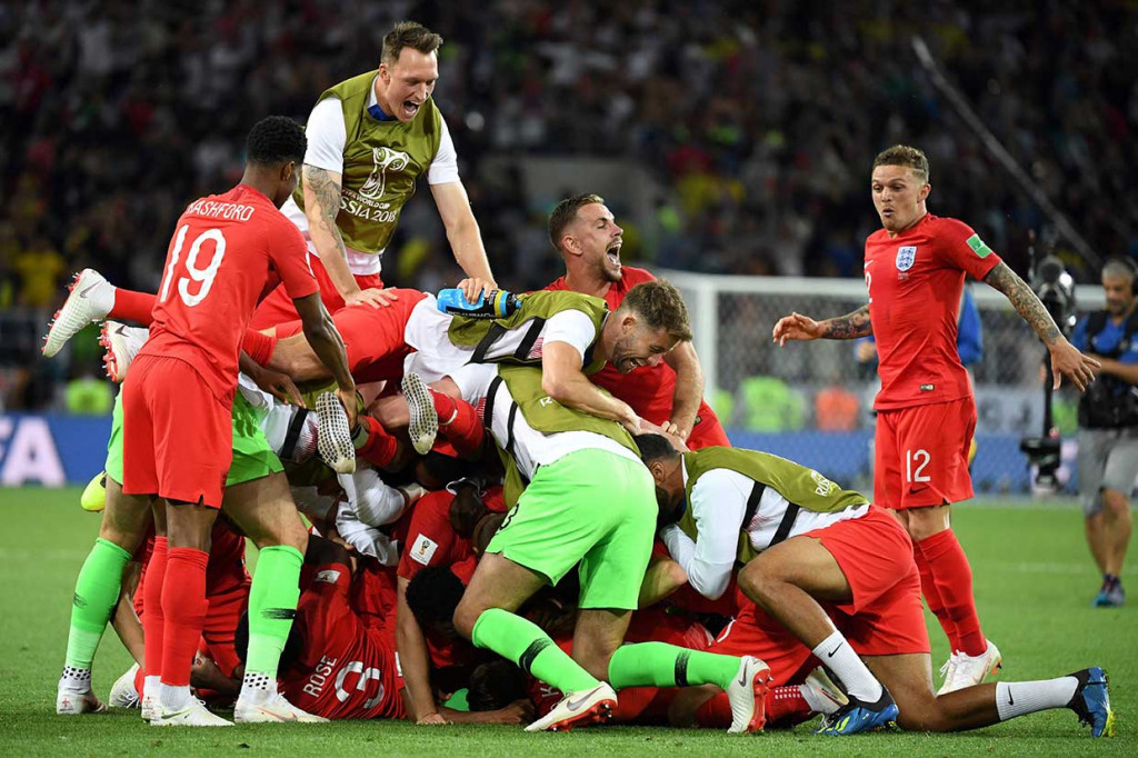 Para pemain Inggris meluapkan kegembiraan mereka usai memastikan diri melaju ke perempat final.