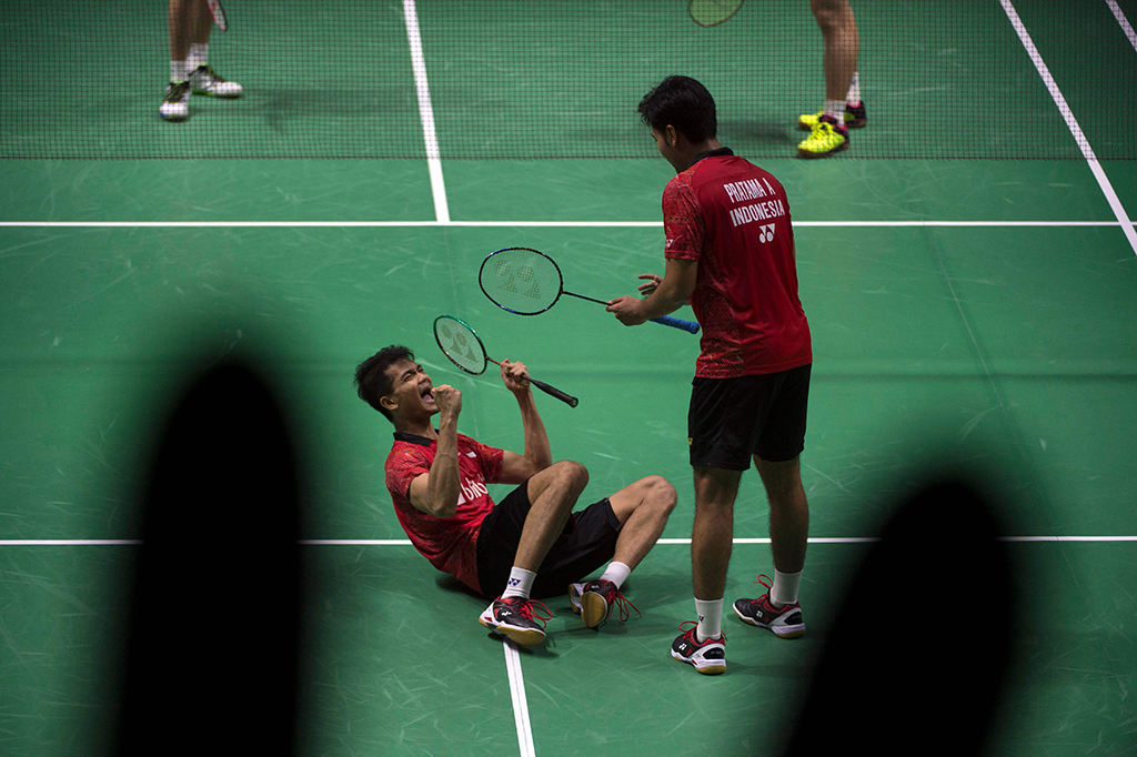 Pasangan ganda putra Indonesia Ricky Karanda Suwardi/Angga Pratama meluapkan kegembiraannya usai menang melawan pasangan asal Tiongkok, He Jiting/Tan Qiang.