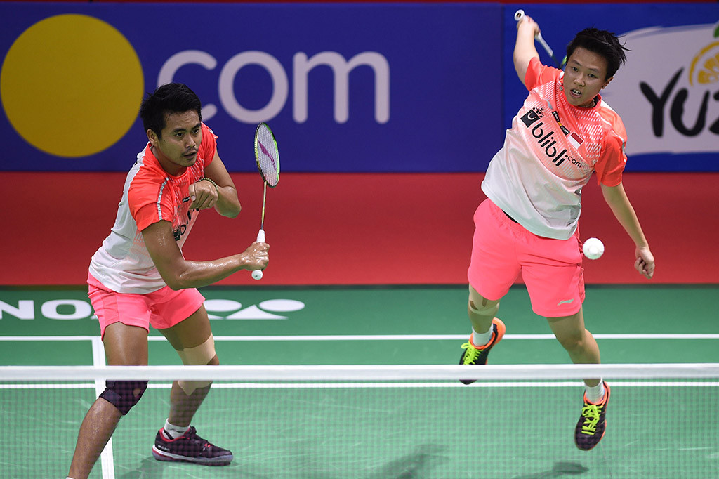 Pasangan Indonesia yang akrab disapa Owi/Butet itu berhasil memastikan tiket ke perempat final setelah menang dengan skor 23-21 dan 21-19.