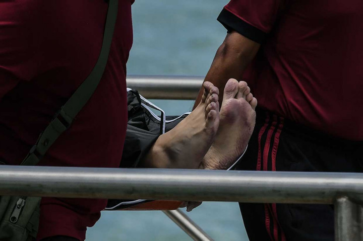 Dua perahu yang membawa puluhan wisatawan, kebanyakan dari Tiongkok, terbalik akibat gelombang tinggi dan angin kencang di lepas pantai Phuket, Kamis, 5 Juli 2018 sore. 41 orang tewas sementara 15 lainnya belum ditemukan akibat peristiwa tersebut.