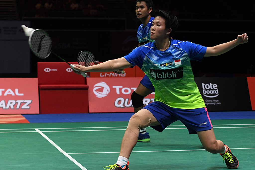 Sebelumnya, ganda campuran Tontowi Ahmad/Liliyana Natsir hanya mampu menjadi runner-up setelah dikalahkan unggulan kedua asal Malaysia Goh Soon Huat/Shevon Jemie Lai di final 19-21 dan 18-21. Afp Photo/Roslan Rahman