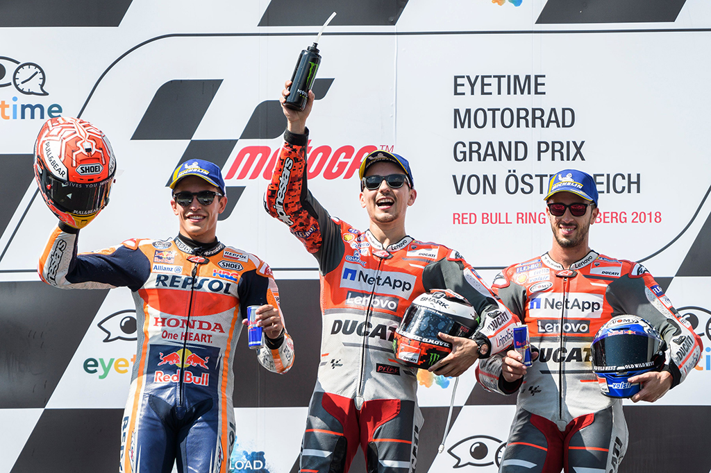 Jorge Lorenzo unggul 0,130 detik atas Marquez di posisi kedua. Kemudian disusul Andrea Dovizioso yang menghuni tempat ketiga. Afp Photo/Jure Makovec