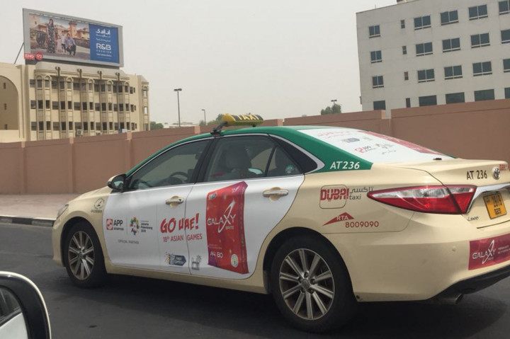 Bila Anda sedang berkunjung atau jalan-jalan ke Dubai, Uni Emirat Arab, jangan kaget bila Anda mendapati logo Asian Games Ke-18 di di bagian samping sejumlah taxi yang beroperasi di Dubai dan Emirat sekitarnya. 