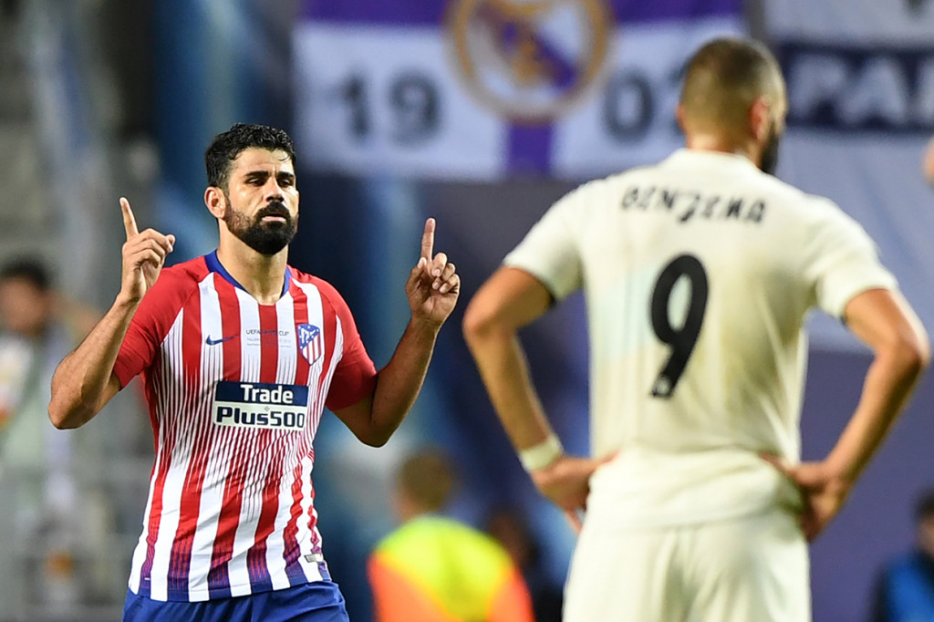Diego Costa kembali menjadi lakon utama Atletico. Gol penyama kedudukan dia pada menit ke-79 memaksa pertandingan berlanjut hingga perpanjangan waktu. Afp Photo/Janek Skarzynzki
