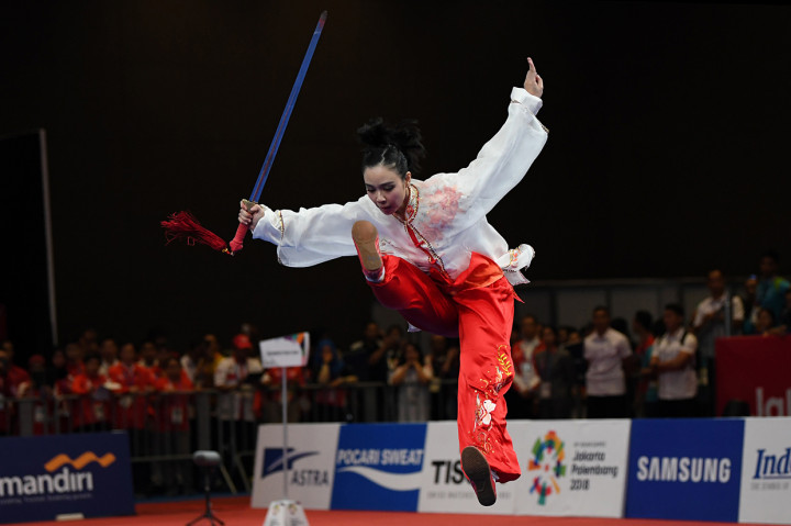 Atlet wushu putri Indonesia Lindswell Kwok, saat berlaga pada nomor Taijiquan putri Asian Games 2018 di JIexpo, Kemayoran, Jakarta. ANTARA FOTO/INASGOC/Ismar Patrizki