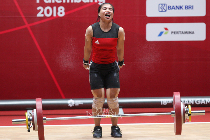 Sri Wahyuni meraih perak usai mencatatkan total angkatan 195 kg(Snatch 88 kg, Clean and Jerk 107 kg).
