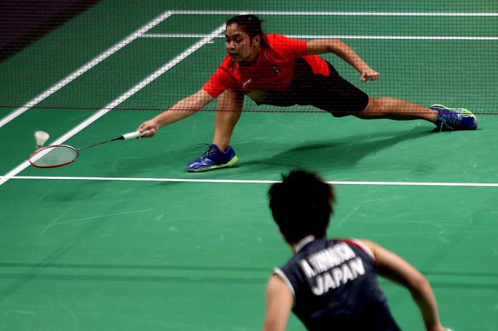Gregoria Mariksa Tunjung memberikan kejutan di partai pertama. Dia mengalahkan peringkat dua dunia, Akane Yamaguchi, dengan rubber game 21-16, 9-21, dan 21-18 untuk membawa Indonesia unggul 1-0 atas Jepang. Antara Foto/INASGOC/Hadi Abdullah
