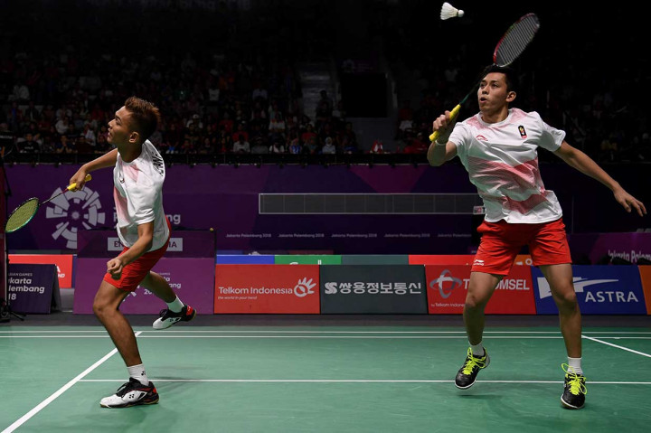 Dan ganda putra kedua Indonesia Fajar Alfian/Muhammad Rian Ardianto harus mengakui keunggulan Liu Cheng/Zhang Nan dengan skor 18-21, 21-17, dan 21-18. INASGOC/Antara Foto/Puspa Perwitasari