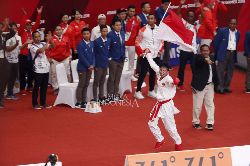 Keberhasilan Rifki menyempurnakan sumbangan medali dari karate, yang sebelumnya memberikan dua perunggu melalui Cokorda Istri Agung Santistyarani di nomor kumite puteri 55kg, dan Ahmad Zigi Zaresta Yuda di nomor kata putra.

