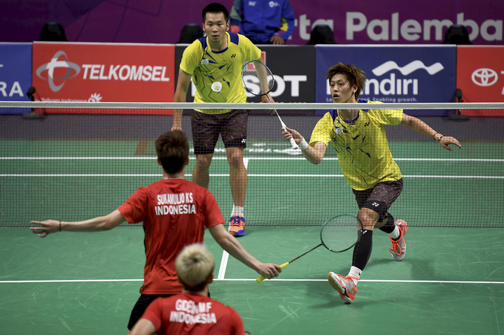 Kevin/Marcus mengalahkan ganda putra Taiwan Lee Jhehui/Lee Yang dalam tiga set 21-15, 20-22, dan 21-12. Antara Foto/INASGOC/Puspa Perwitasari