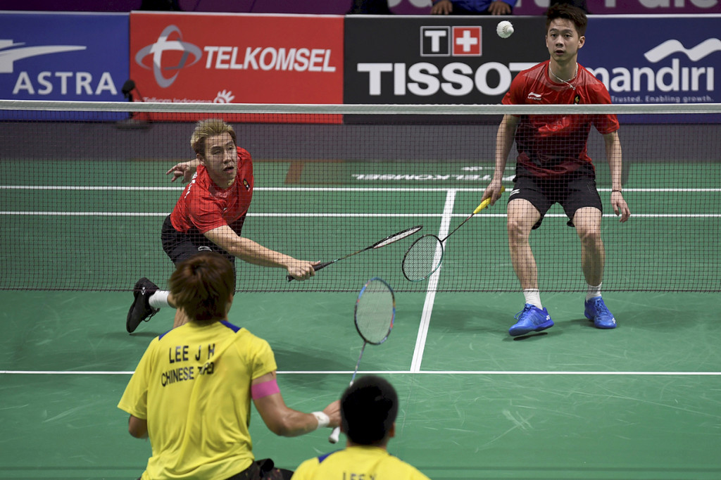 Dengan kemenangan Kevin/Marcus ini, tercipta all Indonesian final di nomor ganda putra Asian Games 2018. Antara Foto/INASGOC/Puspa Perwitasari