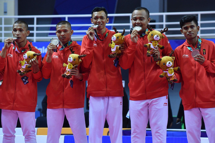 Indonesia kalah dengan skor 1-2 dari Malaysia dan harus puas menjadi penyumbang perak ke-17. Afp Photo/Adek Berry