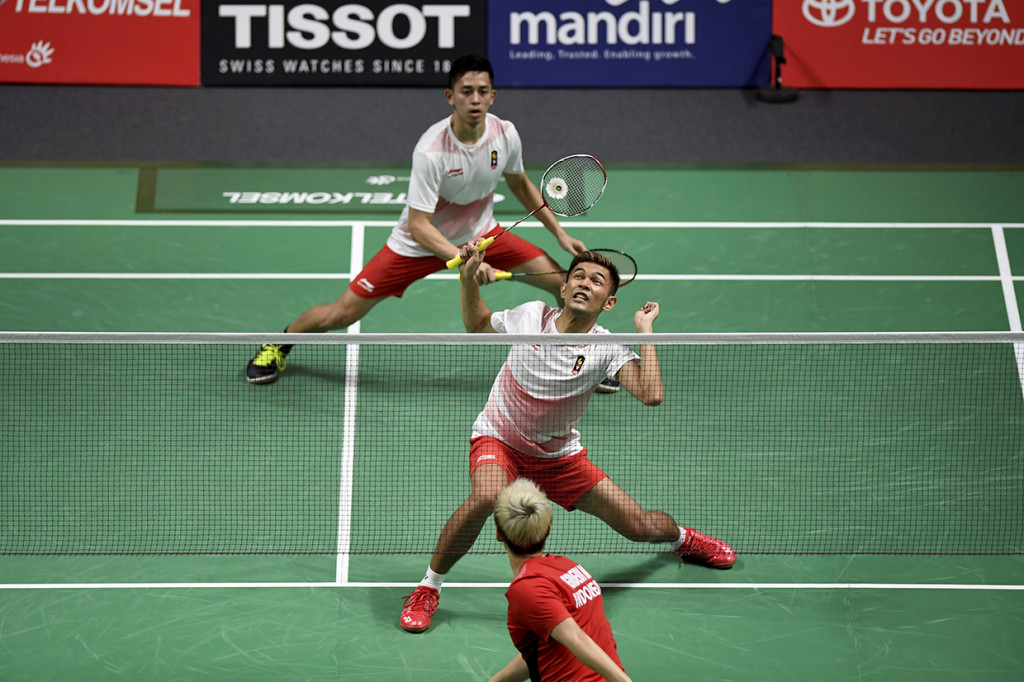 Meski final ganda putra menampilan peserta sesama asal Indonesia, tetapi kedua pasangan tidak ingin kehilangan gengsi untuk menjadi juara di multievent sekelas Asian Games 2018. Keduanya silih berganti dalam memberikan serangan. Antara Foto/INASGOC/Ismar Patrizki